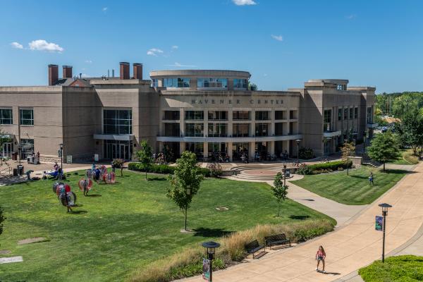 Student walking in front of Havener Center